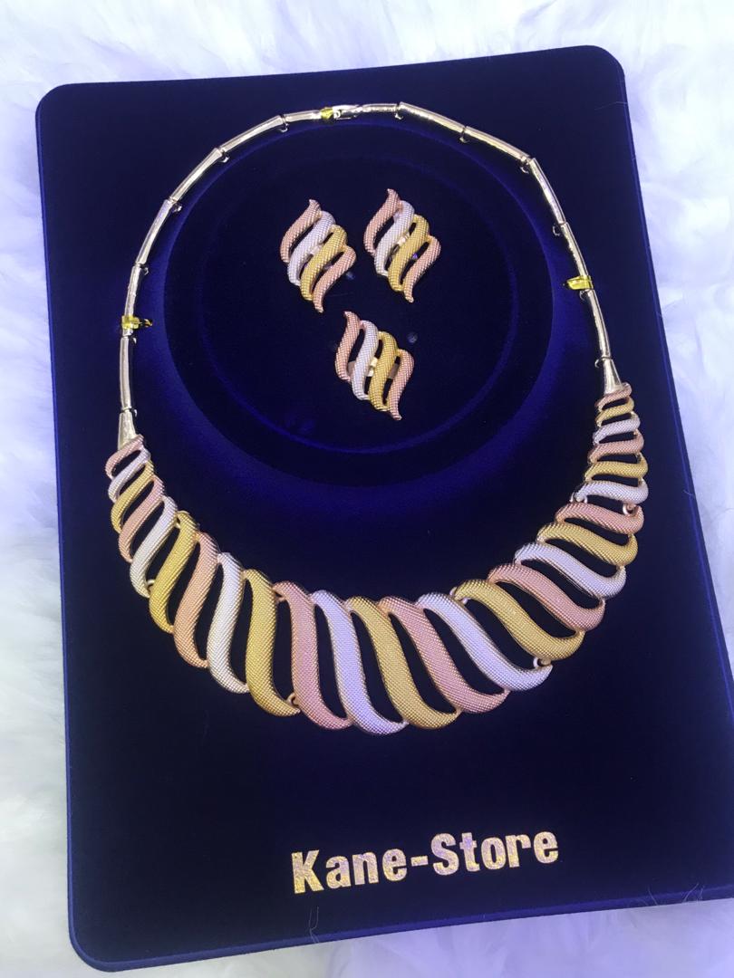 Collier boucle d'oreille et bague