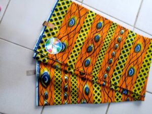 Pagne orangé motif yeux